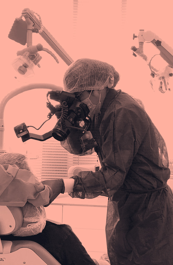 Edwin Zanabria taking photos in clinic